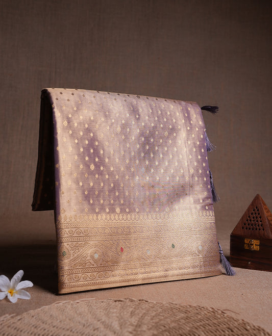 Gold & lavender colour tissue banaras silk saree featuring antique gold zari motifs on the body with rich traditional zari border and pallu, paired with a matching blouse piece.