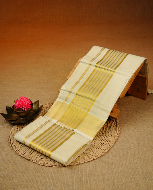 Cream colour cotton set mundu with Gold zari Dotted strips on body, featuring Gold zari kara.