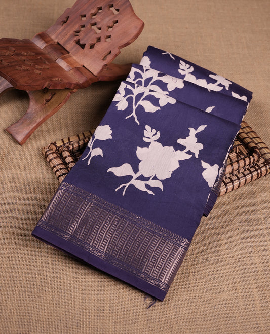 Dark Blue colour Viscos semi printed saree featuring a light golden zari border, abstract off white printed motifs on the body, and comes with a matching blouse