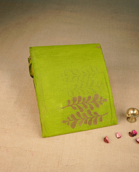 Green colour semi linen saree with elegant gold zari leaf motifs across the body, complemented by a contrast  wine colour with grand gold zari pallu and a borderless design, paired with a matching blouse piece.