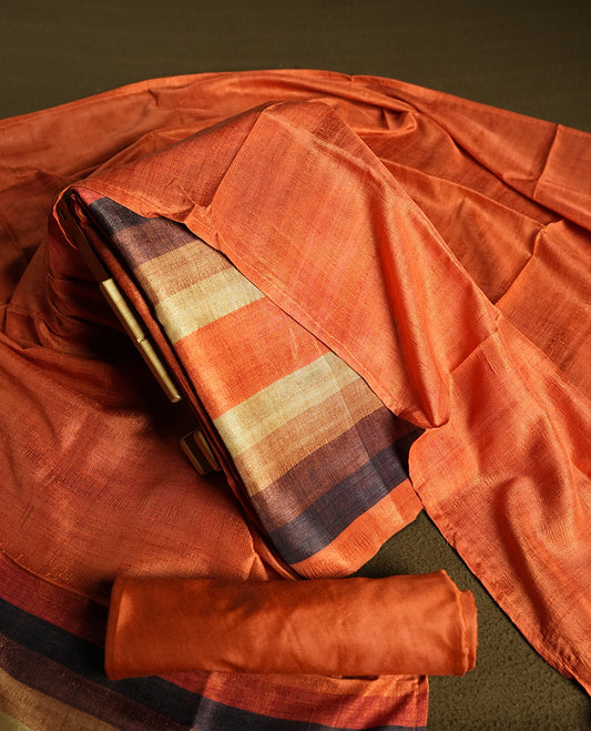 Orange colour churidhar material featuring elegant horizontal stripes on the yoke and dupatta, woven in shades of Brown and Orange & Paired with a matching plain bottom