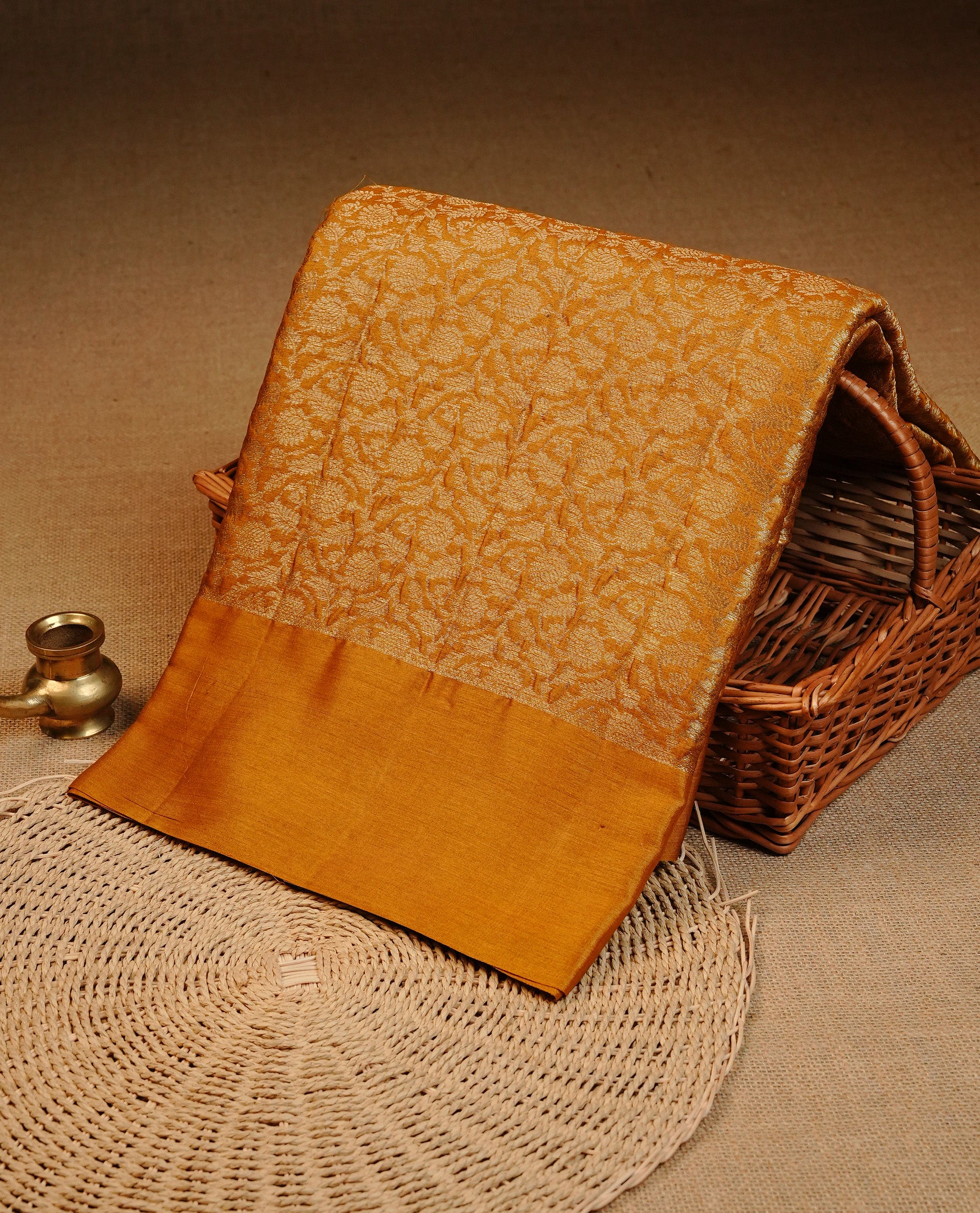 Mustard colour Pure tusser silk saree featuring Gold Zari floral Kodi Work On Body , A Plain  border & Grand  pallu Paired With  a matching blouse piece..