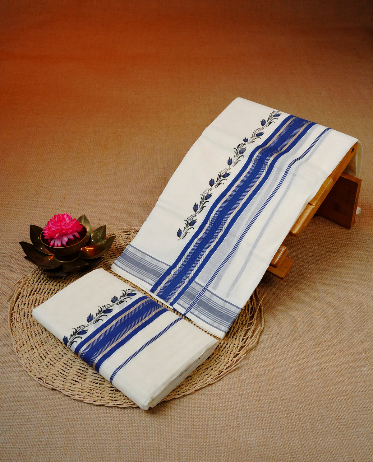 Cream colour cotton set mundu featuring Blue colour kara with print