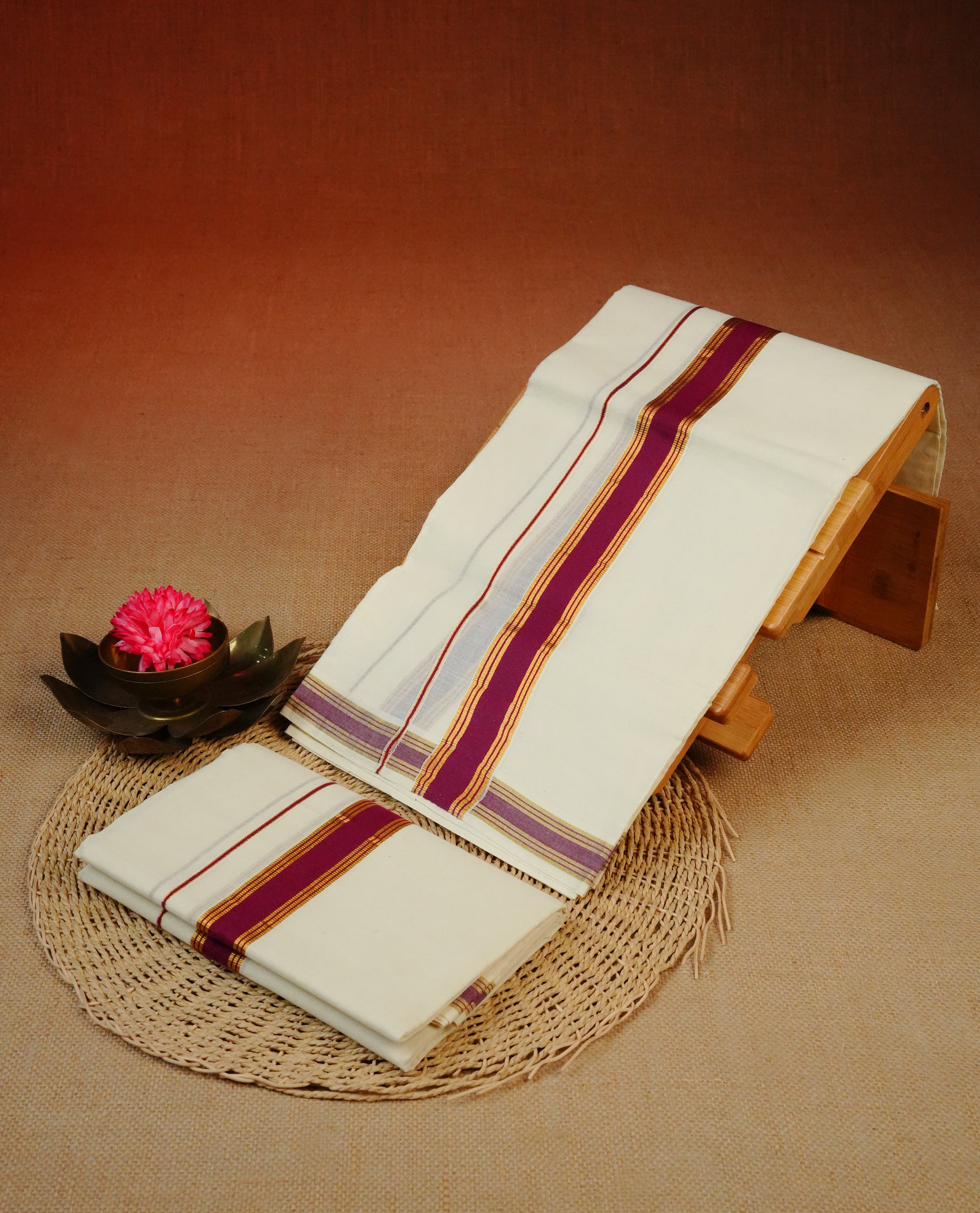 Cream colour Cotton set mundu With plain body, enhance gold zari with Maroon kara.