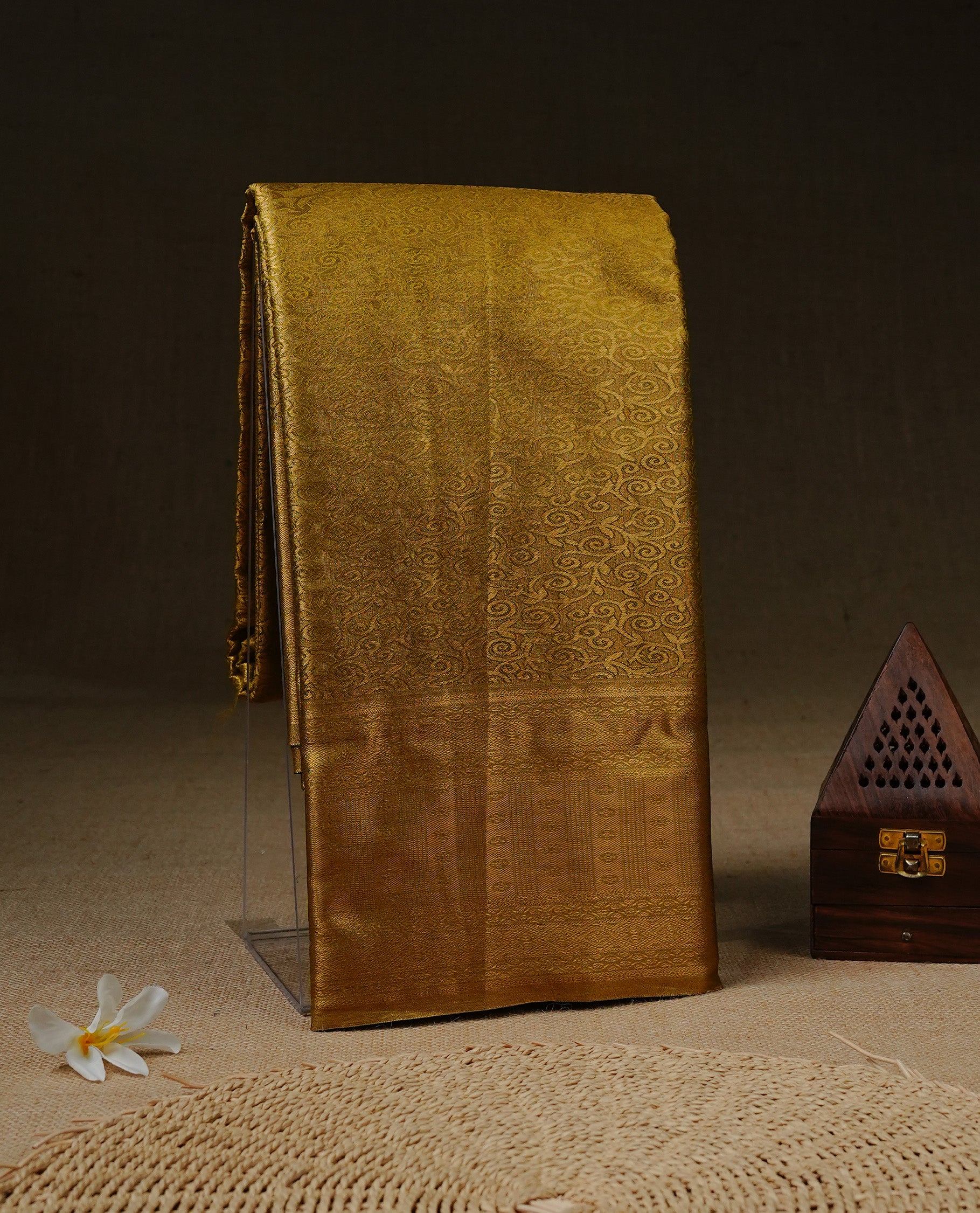 Olive & Gold colour Tissue silk saree featuring Maroon & Silver zari kodi pattern on body, enhanced with Zari border on self colour, paired with matching blouse piece.