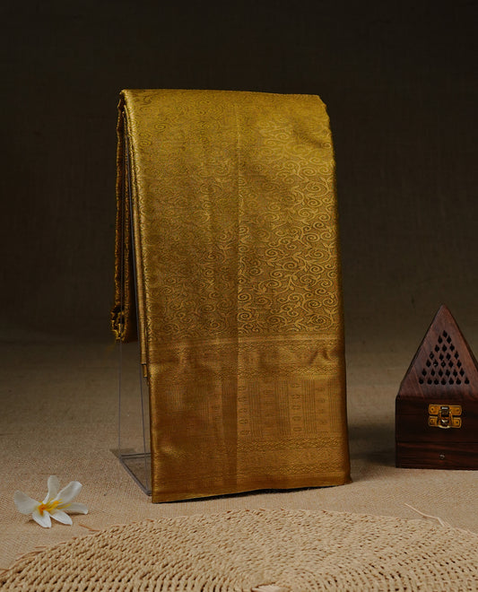 Olive & Gold colour Tissue silk saree featuring Maroon & Silver zari kodi pattern on body, enhanced with Zari border on self colour, paired with matching blouse piece.