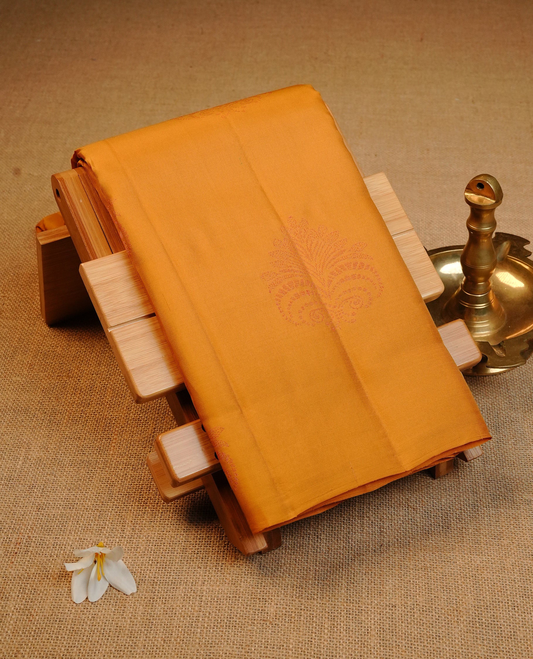 Mustard Yellow Colour Traditional Kancheepuram Silk Saree Featuring Bronze Zari Pattern  Motifs on the Body, Designed Without a Border and with a Grand Pallu, Paired with a Matching Blouse.