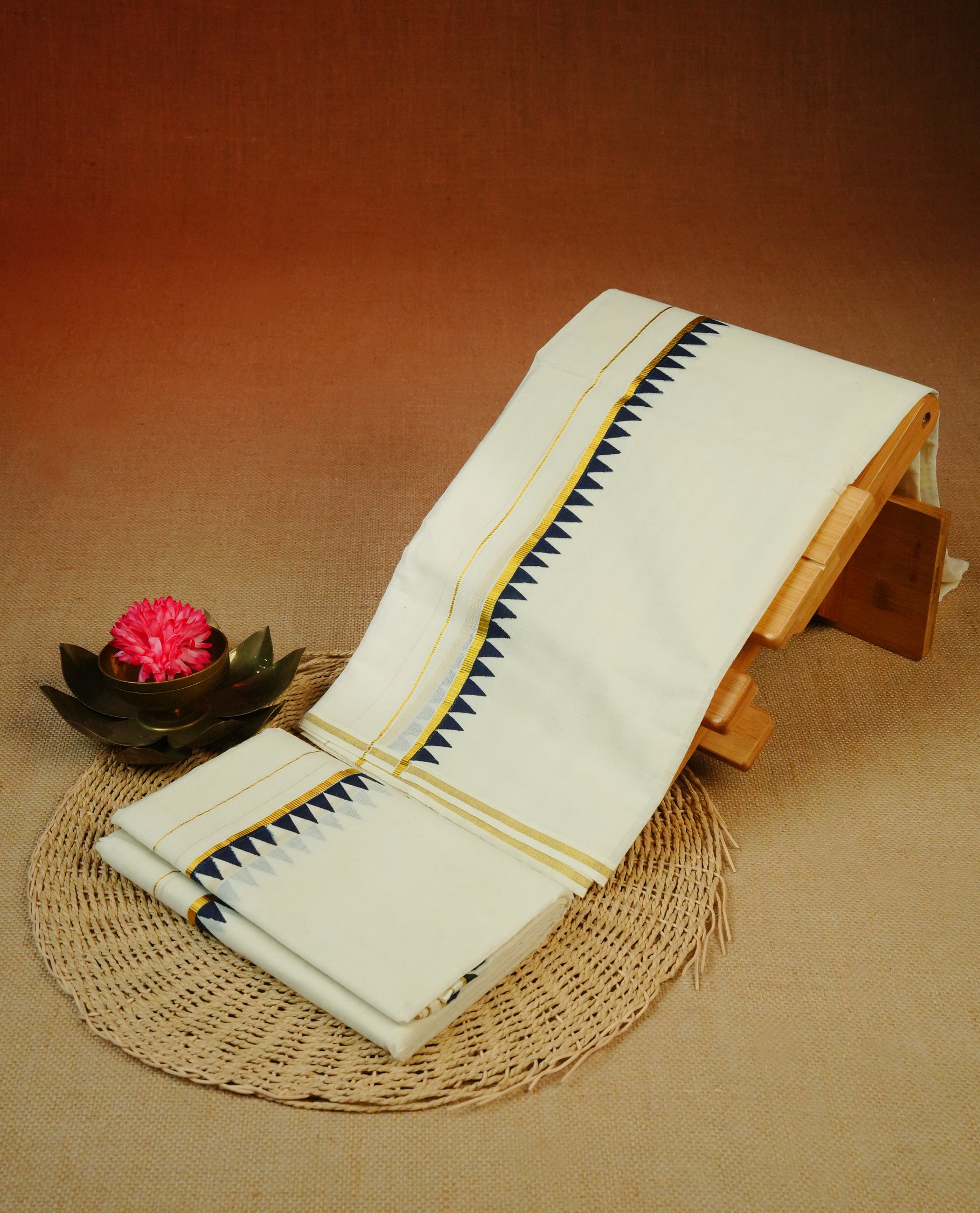 Cream colour Cotton set mundu With plain body, enhance gold zari with black temple print kara.