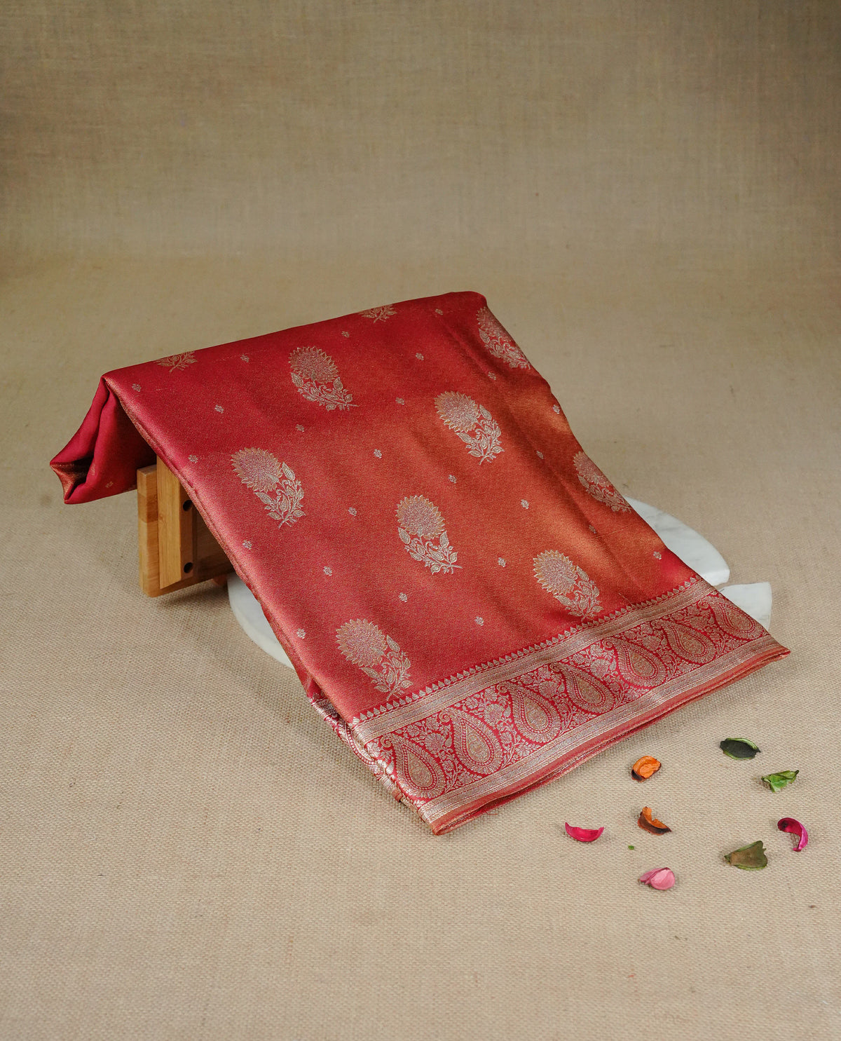 Red colour Mulberry silk saree featuring Gold zari small buttas & floral motifs  on body, complemented by self colour with Gold zari border, comes with matching blouse piece.
