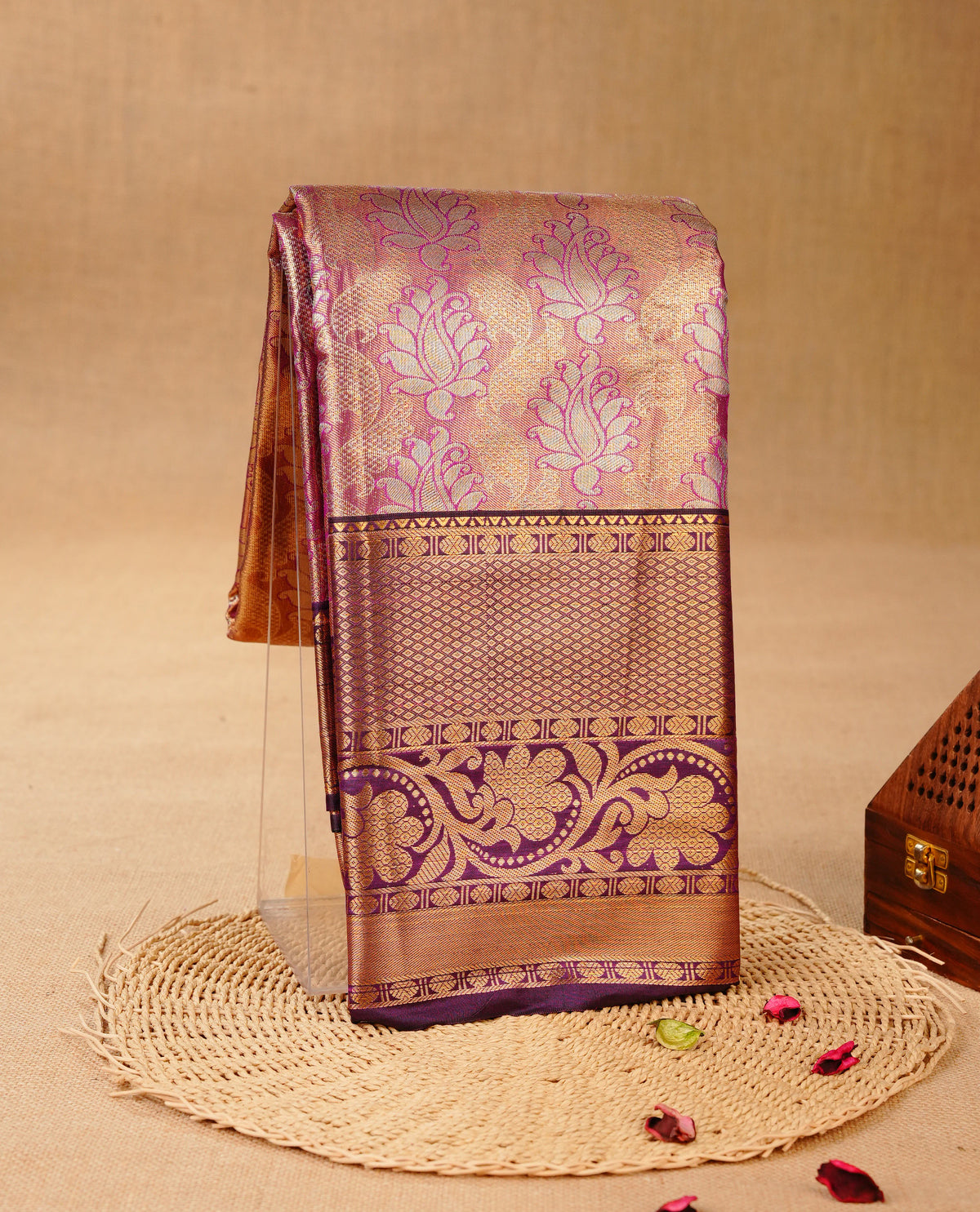 Violet & Gold colour Double shade Semi tissue silk saree featuring self color Floral pattern on body, Contrast Purple colour with Fancy border, paired with matching.
