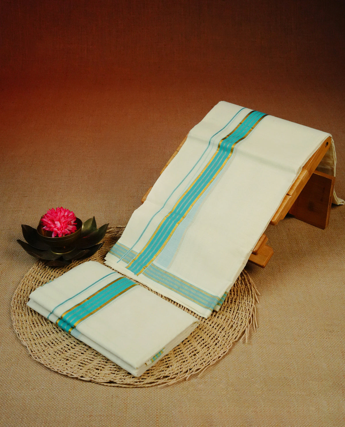Cream colour cotton Set Mundu With Plain body, enhanced with Gold kasavu & blue kara.