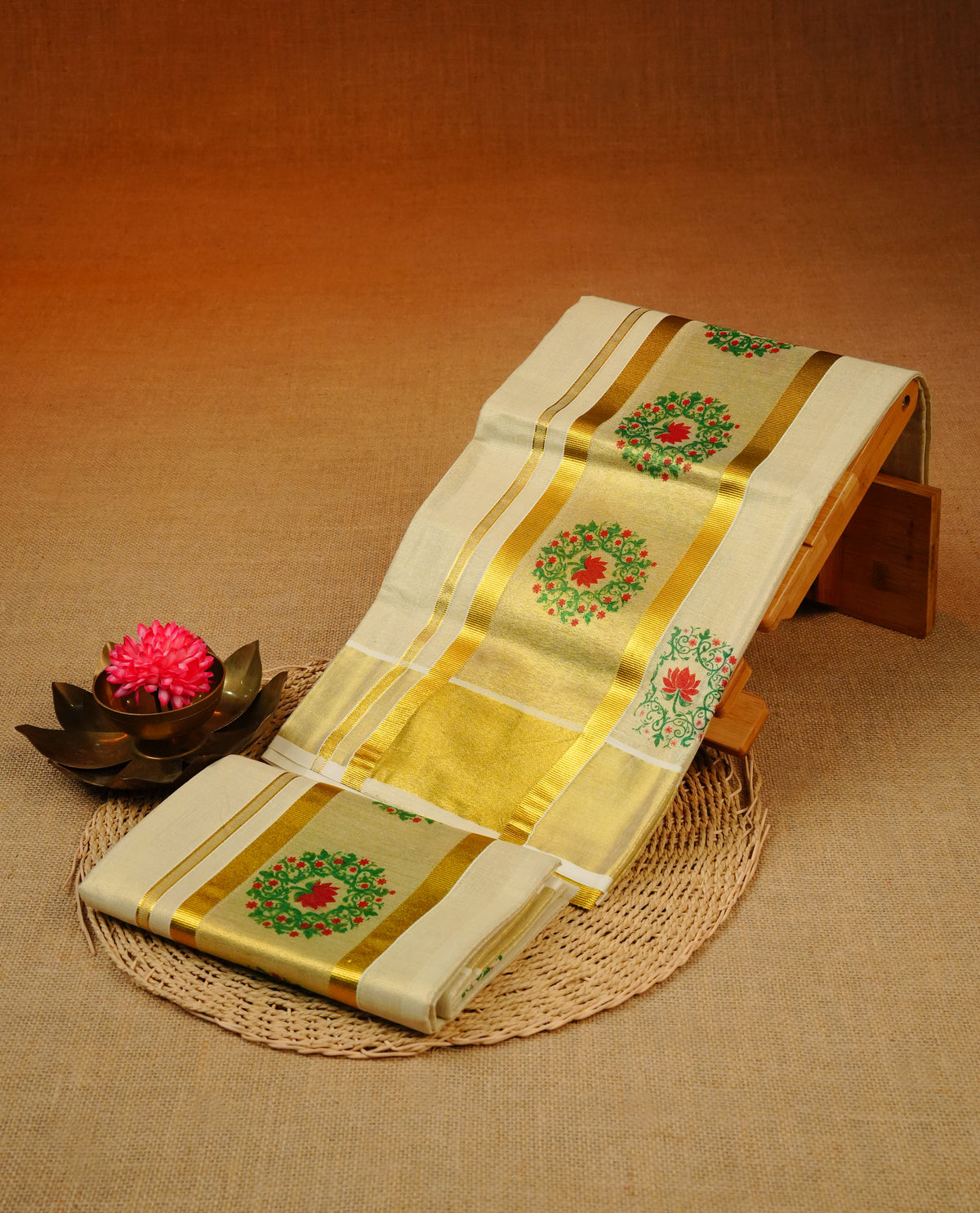 Cream Colour  tissue set mundu featuring a Plain body, enhanced with Floral Prints On gold zari kara.