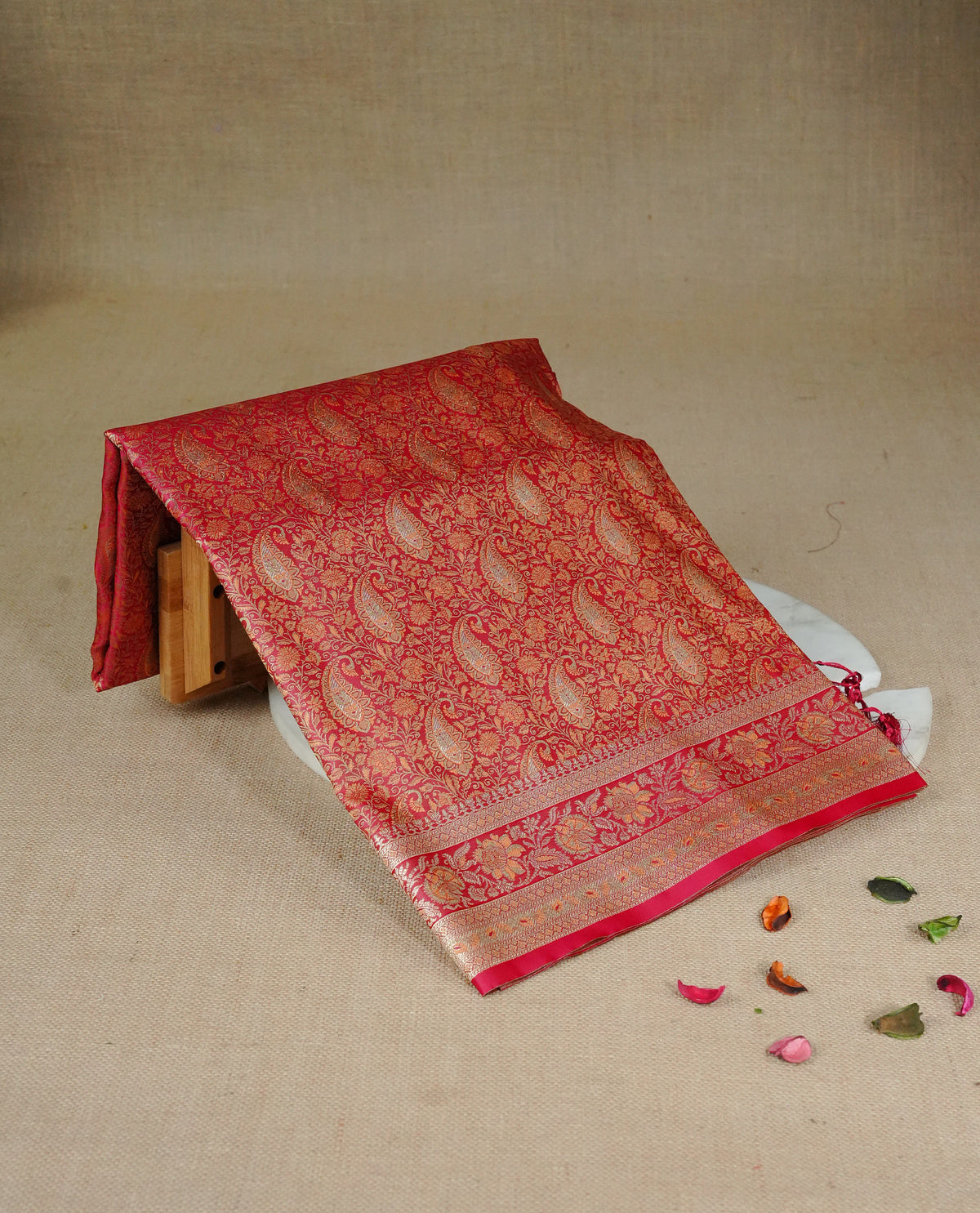 Maroon colour Mulberry silk saree featuring gold zari Mango & floral kodi pattern across body, complemented by self colour border with gold zari work, comes with matching blouse piece.