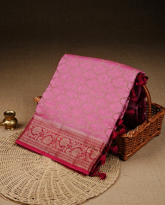 Pink colour Banaras silk saree featuring gold zari Geometric pattern on body, complemented by contrast Magenta colour with zari border, comes with matching blouse piece.