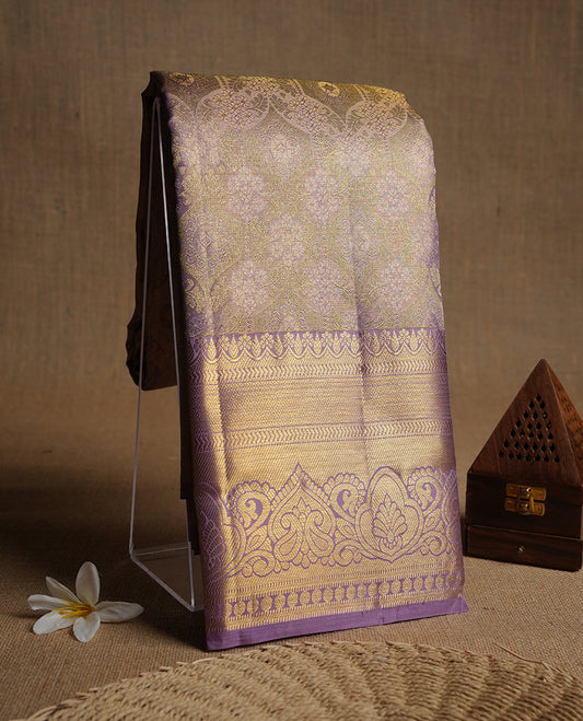 Lavender & gold double shade colour kancheepuram tissue silk saree highlighting gold zari pattern body, with contrast Lavender colour colour with traditional border and paired with matching blouse.