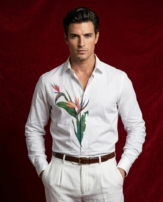White colour shirt designed with Leaf print on body, adored with full sleeve.
