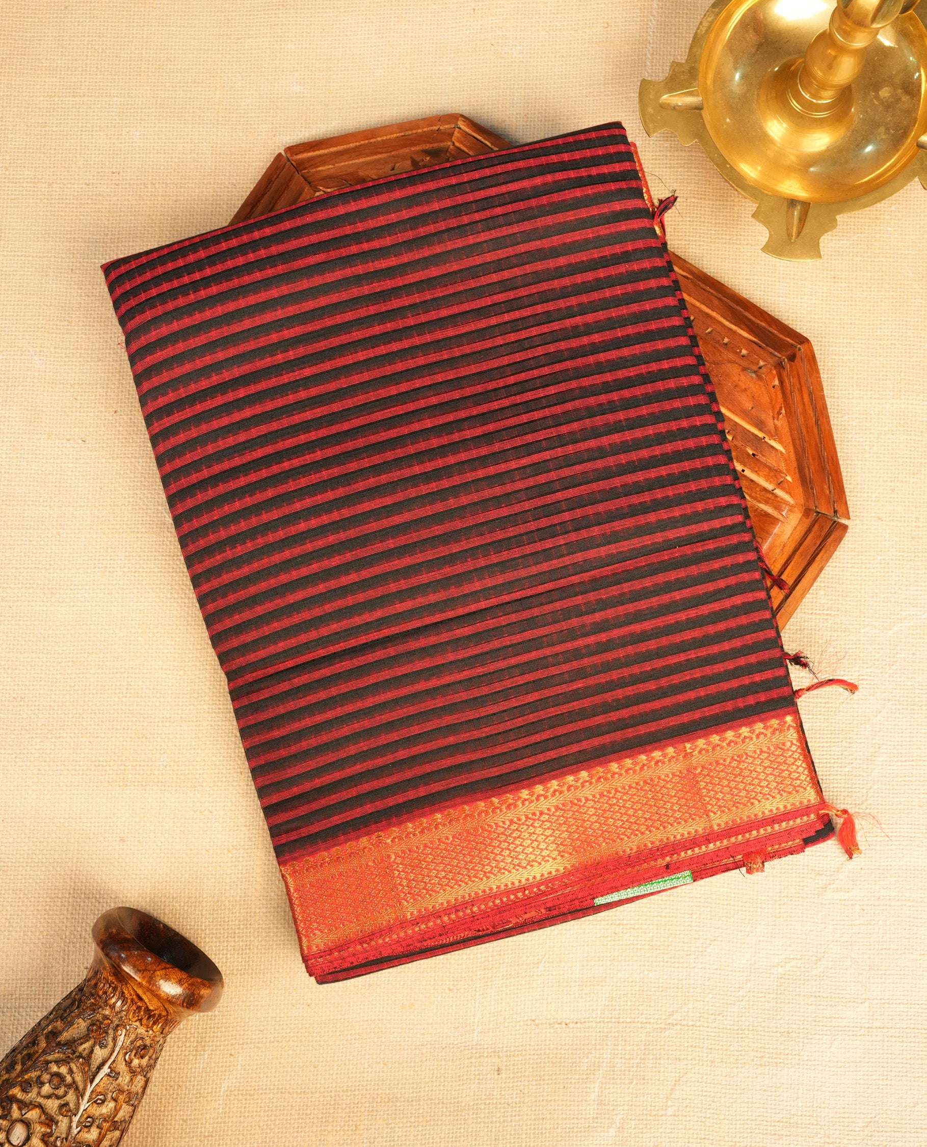 Dark Red  Mangalagiri cotton saree featuring elegant Black stripes On Body , Complemented by Contrast Check Pattern , Gold  zari border & Contrast  pallu, Paired With a matching blouse piece.