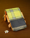 Green colour soft silk saree with contrast Black border.