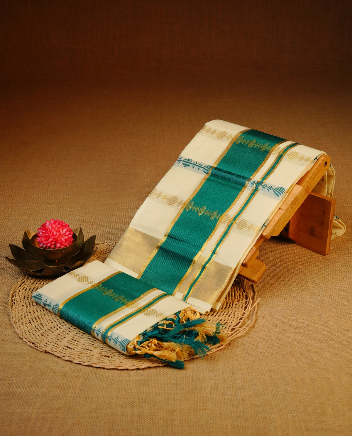 Cream colour cotton set mundu featuring Gold & teal colour strips on body, gold kasav with teal kara.