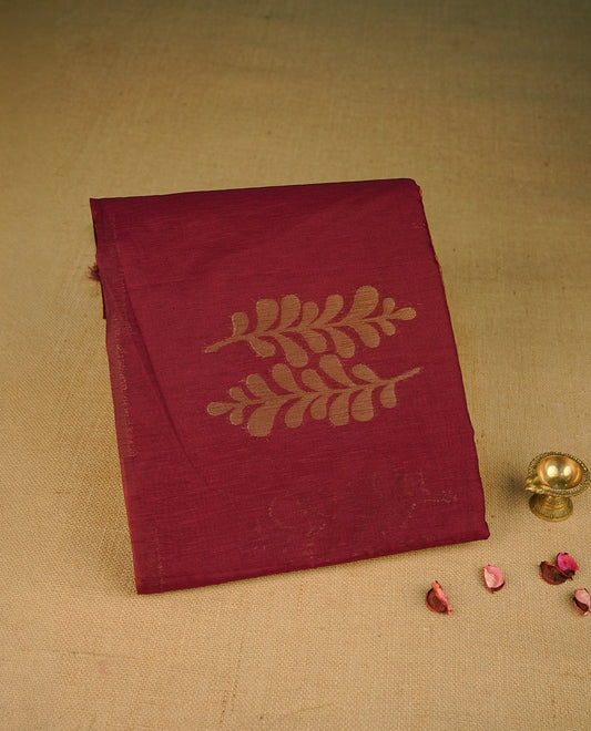 Red colour semi silk saree featuring Gold zari Leaf pattern on body, complemented by contrast colour with Gold zari border, comes with matching blouse piece.