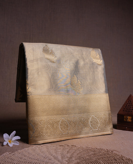 Olive & Gold double shade colour tissue banaras silk saree featuring antique gold zari motifs on the body with rich traditional zari border and pallu, paired with a matching blouse piece.