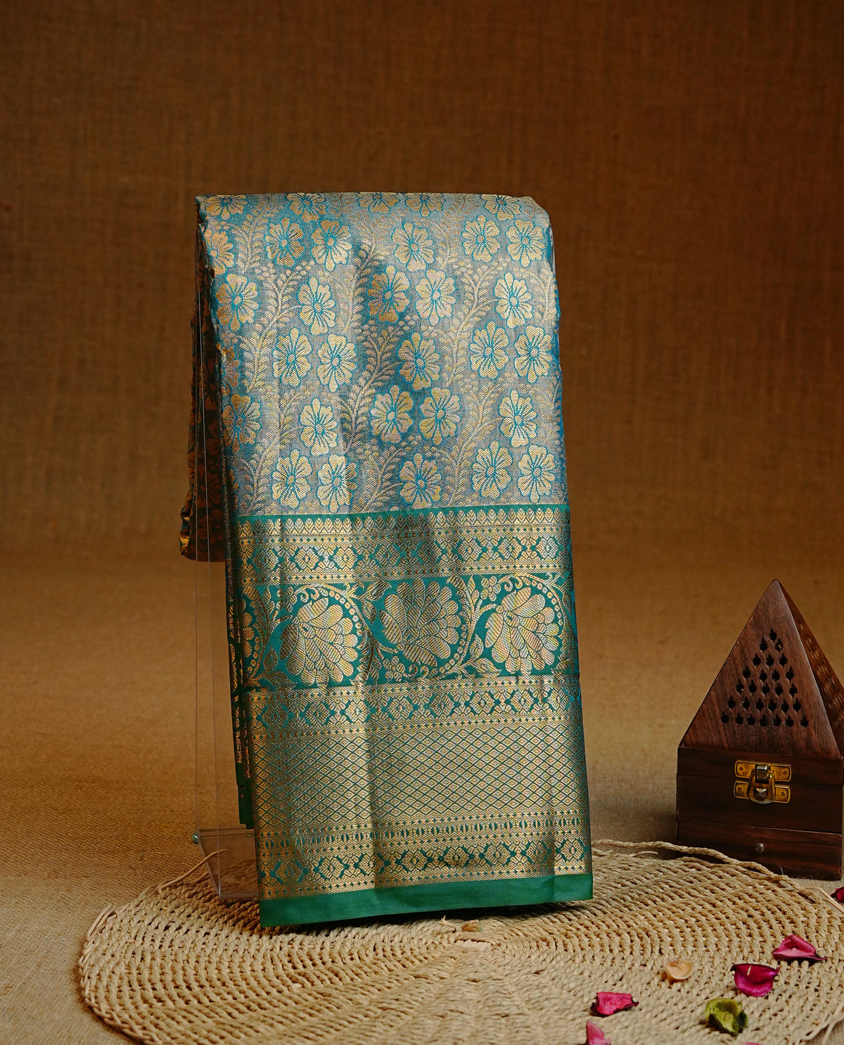 Light blue & Silver colour Double shade Semi tissue silk saree featuring Gold zari Kodi pattern on body, Contrast green colour with traditional border, paired with matching blouse piece.