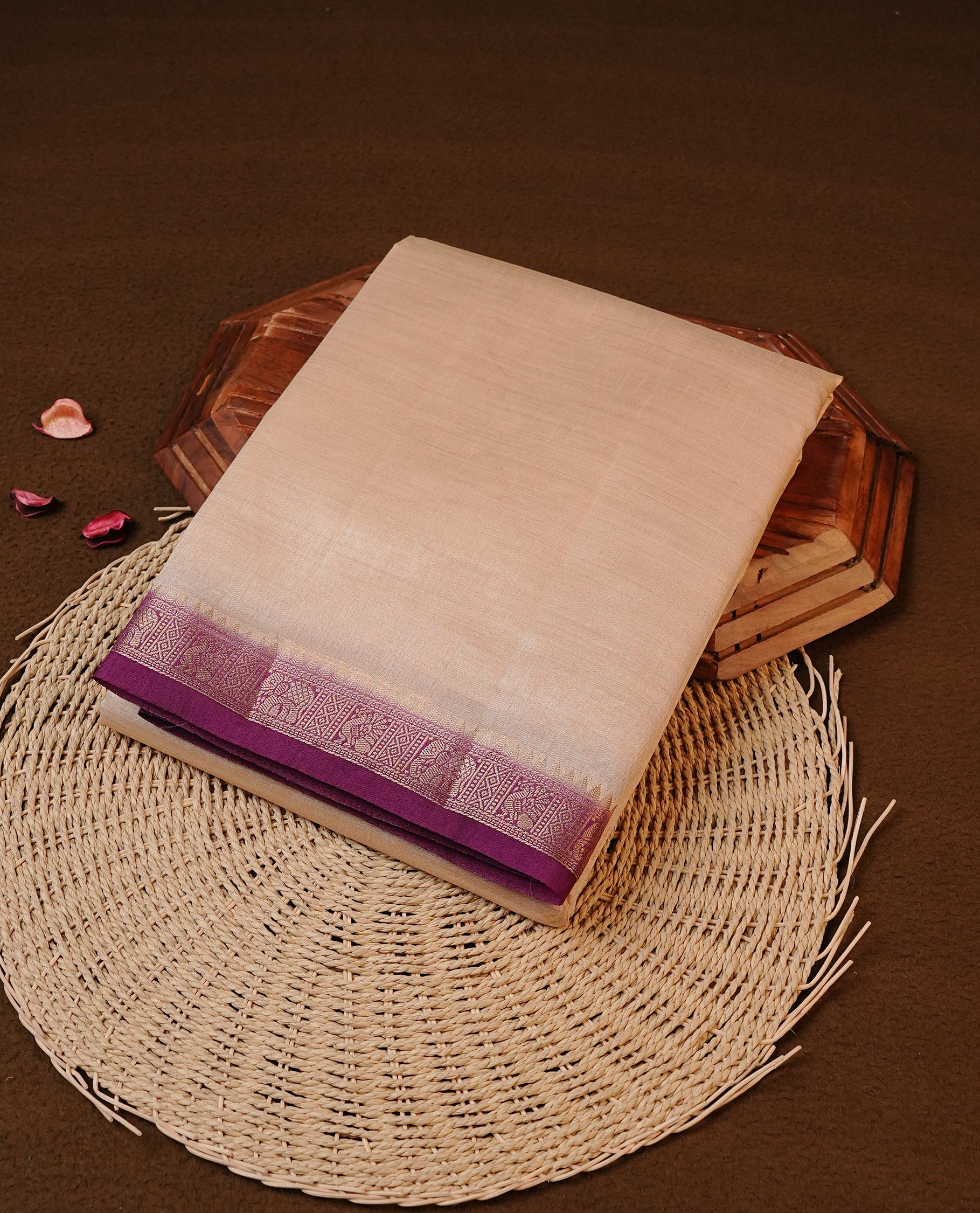 Cream colour Tussar silk saree Featuring Elegant Plain body, complemented by Contrast Purple colour with gold zari border, paired with matching blouse piece.