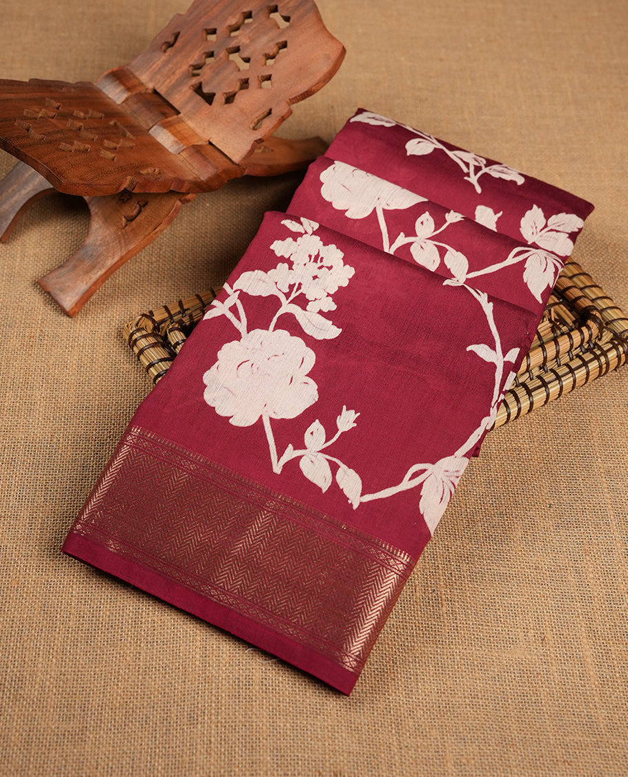 Brick Red colour Viscos semi printed saree featuring a light golden zari border, abstract off white printed motifs on the body, and comes with a matching blouse