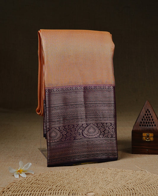 Peach cream colour Net Tissue saree Elegant plain body, complemented by Purple colour with Light gold zari traditional border, paired  with matching blouse piece.
