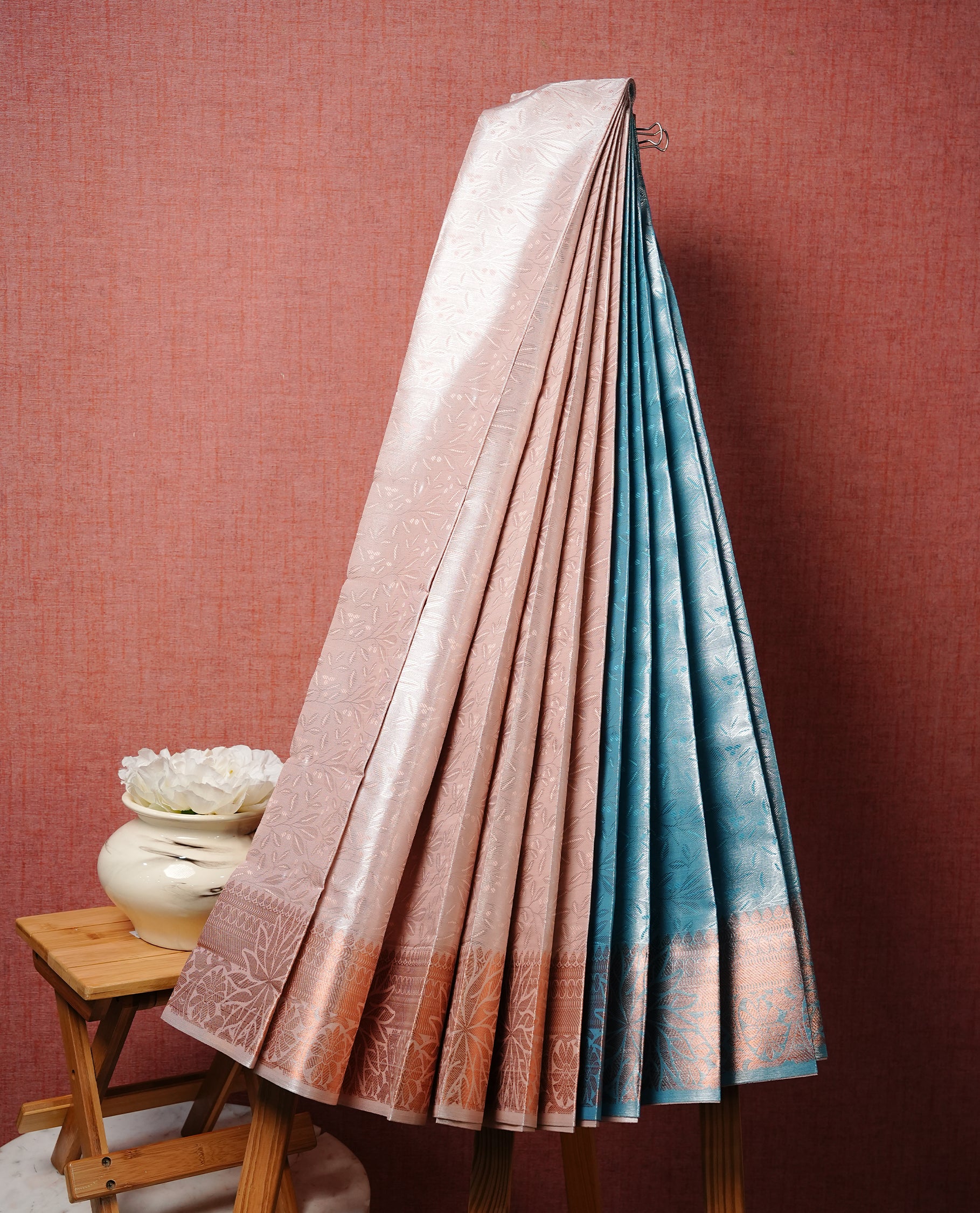 Light pink colour Semi silk saree Featuring gold zari motifs on body, complemented by Self colour with antique zari border, paired with matching blouse piece.