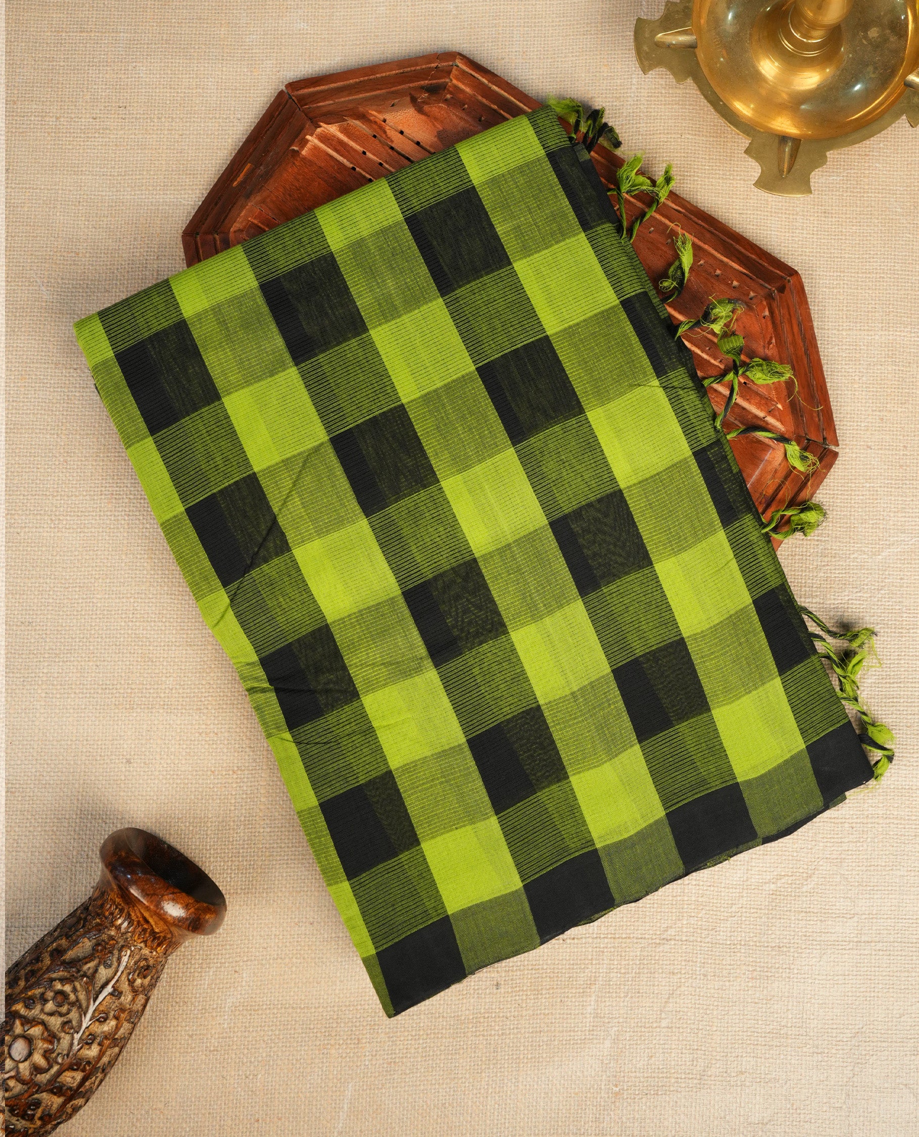 Black and green Colour  Mangalagiri cotton saree with a bold checked body & striped pallu, Paired with a matching blouse piece.