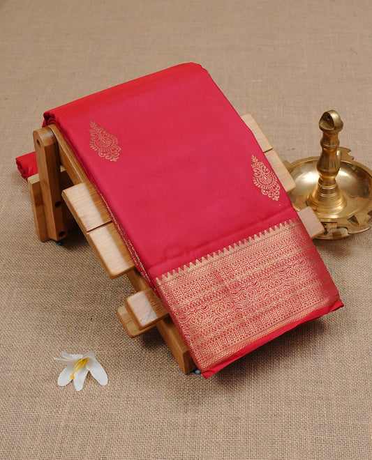 Red Semi Wedding Silk Saree featuring Gold Zari Motifs On body, Complemented with traditional zari with Self colour border, paired with matching blouse piece.