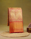 Red & Gold double shade colour pure tissue silk saree featuring Gold zari Zigzag with floral pattern on body, complemented by contrast Red colour traditional border, comes with matching blouse piece.