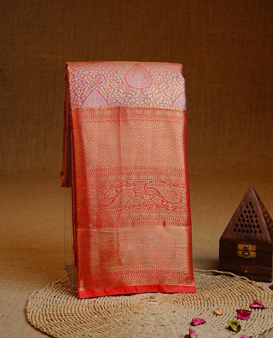Orange & Gold Double shade Semi Tissue Silk saree featuring Light gold pattern on body, complemented by Contrast Orange with gold zari border, paired with matching blouse piece.
