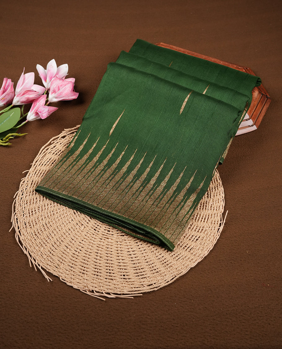 Dark green colour semi banaras tussar georgette saree featuring antique gold zari buttas on body, temple pattern on border and floral pattern on pallu, paired with matching blouse piece.