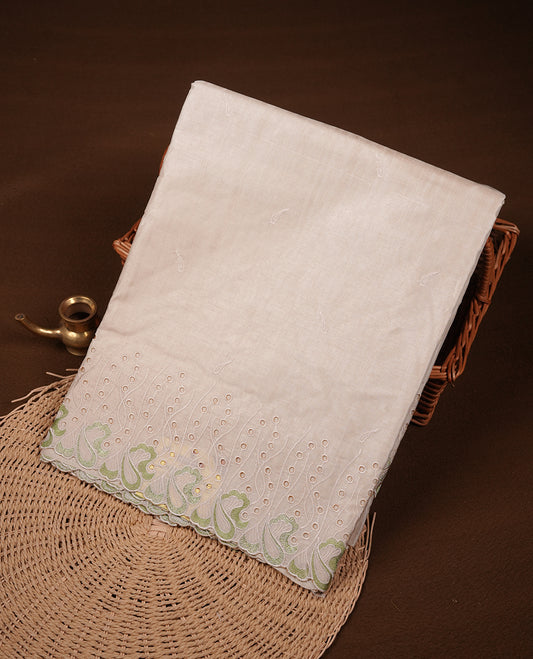Beige colour Tussar silk saree featuring Elegant plain body, highlighting Green colour thread worked scalp border, pallu and paired with matching blouse piece.