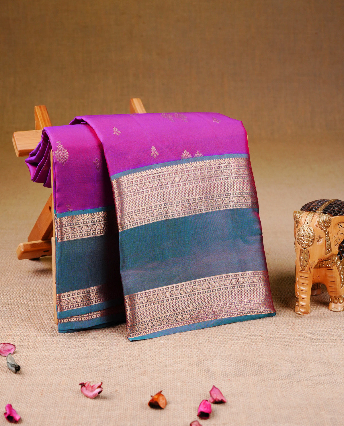 Violet Dual shade colour Traditional Kancheepuram Silk Saree with Elegant Gold Zari Buttas on the Body, Enhanced with a Contrast teal With dual shade Gold Zari Border and  Pallu, Paired with a Matching Blouse Piece.