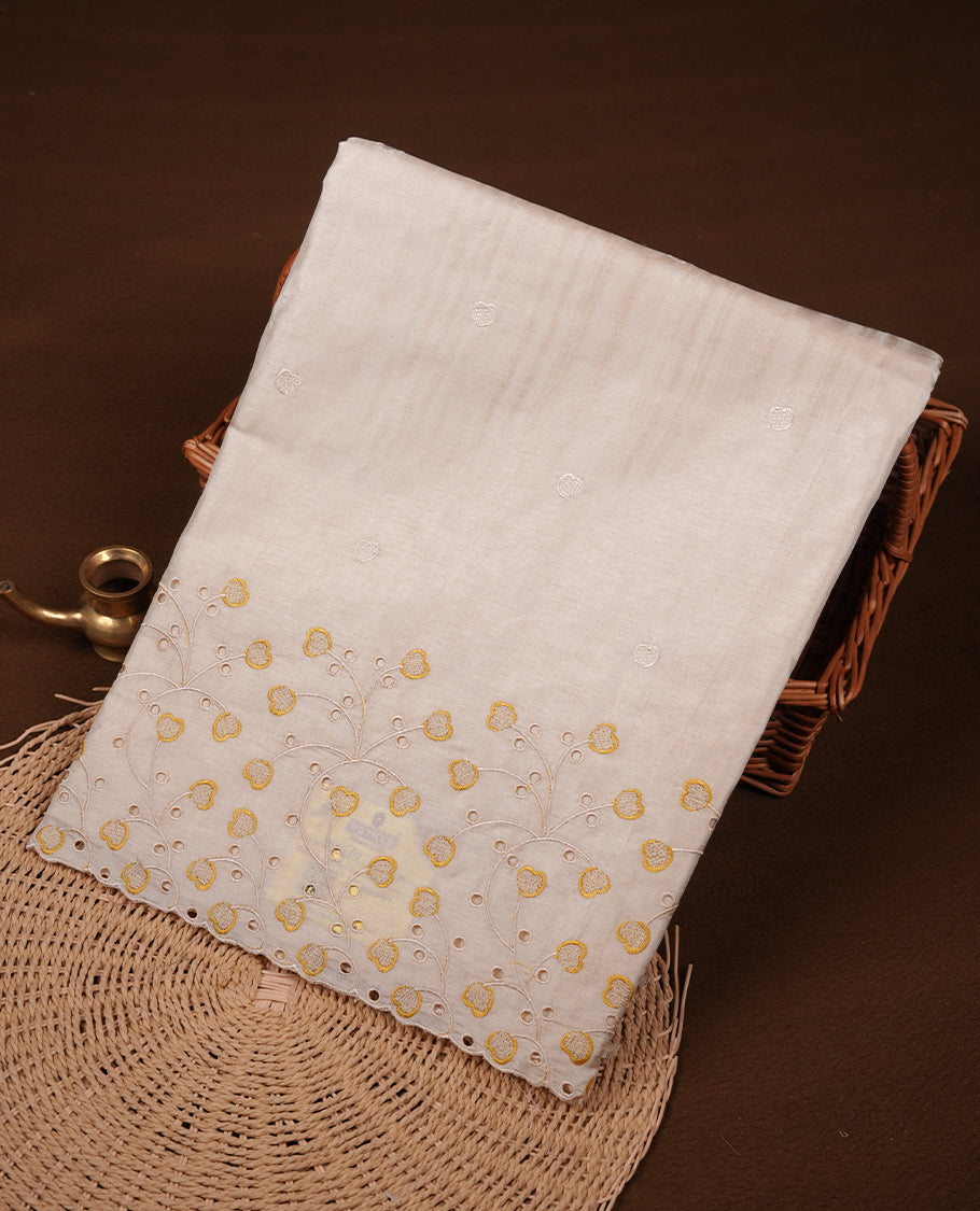 Beige colour Tussar silk saree featuring Elegant plain body, highlighting Yellow colour thread floral kodi worked scalp border, pallu and paired with matching blouse piece.