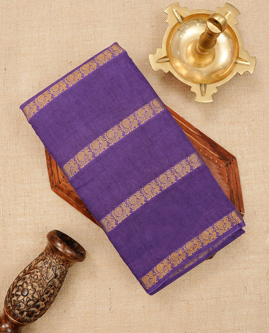 Purple Colour Sungudi Cotton Saree with peacock gold zari stripes on the body, a matching gold zari border, and a striped gold zari pallu. Paired with a contrast Magenta blouse piece  featuring gold zari work.