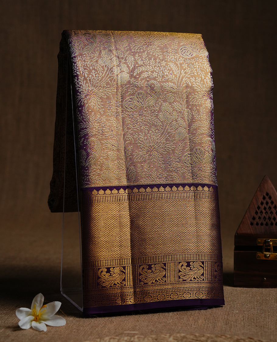 Gold & indigo double shade colour kancheepuram tissue silk saree featuring gold zari floral kodi pattern on body, complemented by contrast indigo colour with traditional border, paired with matching blouse piece.