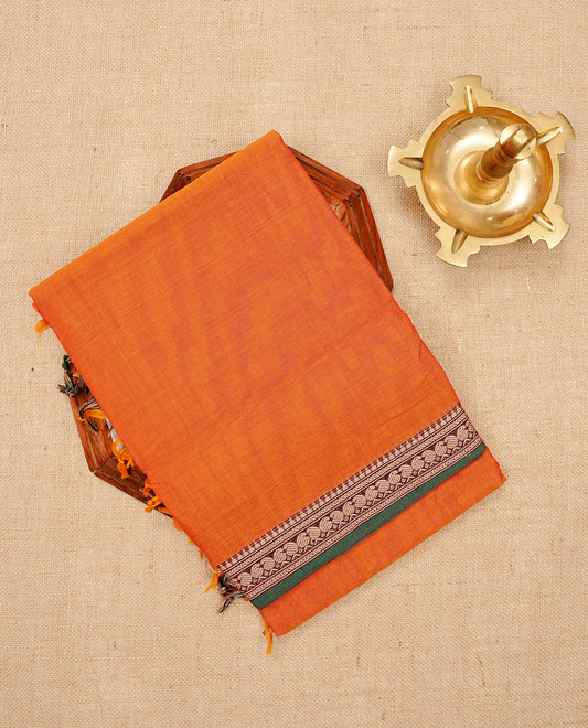 Orange colour Narayanapattu cotton saree with a plain body, complemented by a green colour with Beige colour mango motifs border & a striped contrast pallu, paired with a matching blouse piece.