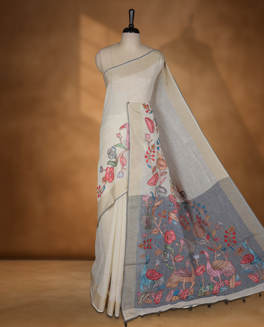 Cream colour cotton linen silk saree featuring Floral  & brids printed pattern on body, golden simple border with gray colour pallu and comes with a matching blouse