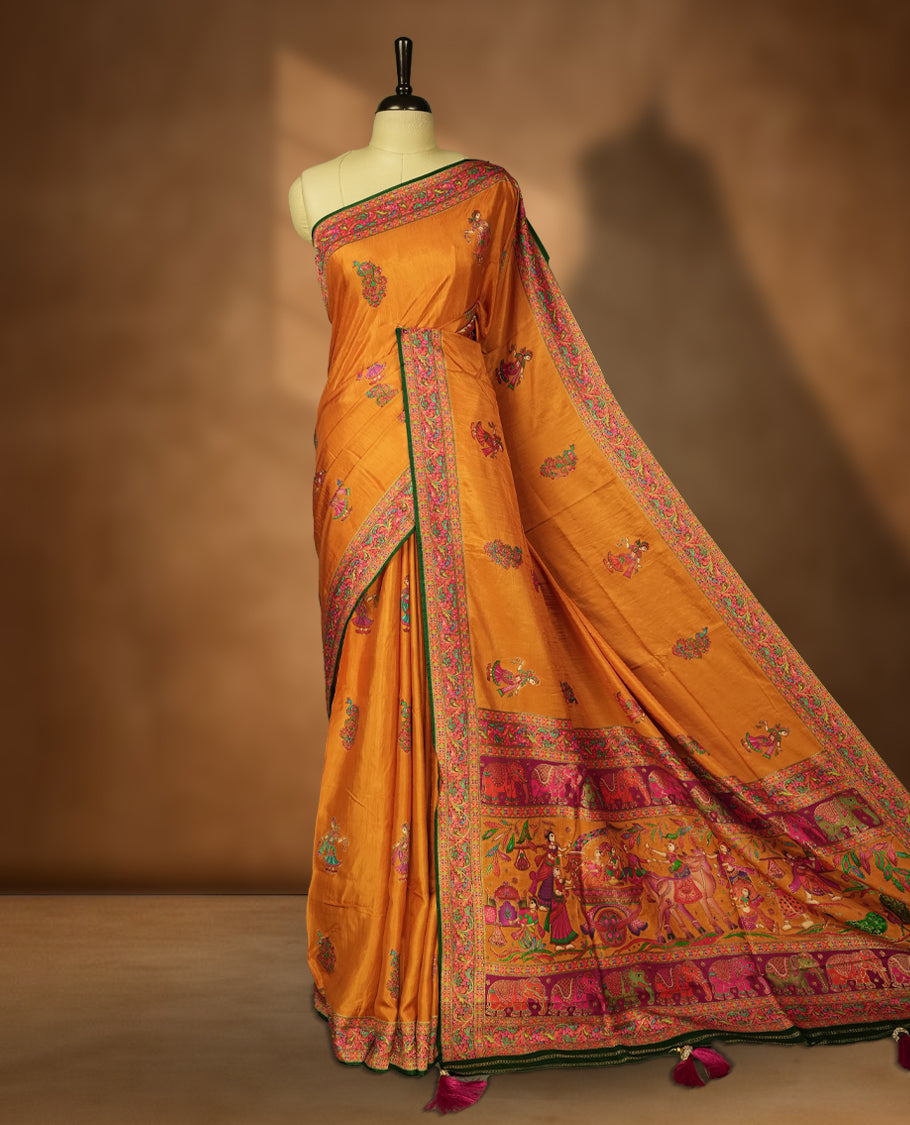 Orange Pashmina Silk Saree with Intricate Embroidered Buti Work on Body, Featuring Multicolor Dancer and Floral Motifs on Vibrant Pink-Green Zari Border & Grand Pallu, Paired with Matching Blouse Piece