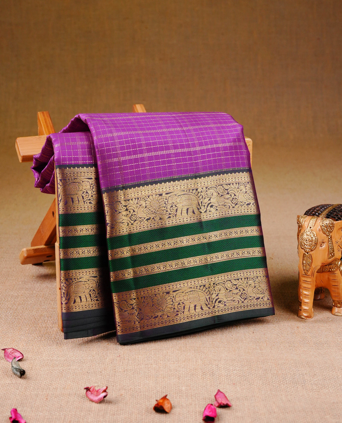 Royal Purple colour Kancheepuram Silk Saree with Gold Zari Checks on body, Contrast Green colour with Gold Zari Border & Rich Woven Pallu, Paired with a matching blouse piece
