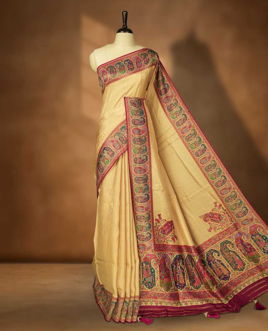 Beige Pashmina Silk Saree with Plain Body, Adorned with Intricately Woven Multicolor Elephant, Peacock, and Floral Motifs on Vibrant Pink-Green Zari Border & Grand Pallu, Paired with Matching Blouse Piece