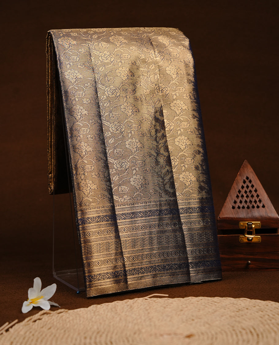 Dark blue & Gold colour semi tissue silk saree featuring gold zari pattern on body, self colour with gold zari traditional border, paired with matching blouse piece.