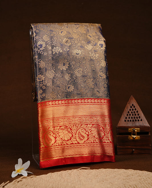 Blue & gold double shade colour semi tissue silk saree featuring gold zari floral kodi pattern on body, contrast Red colour with gold zari traditional border, paired with matching blouse piece.
