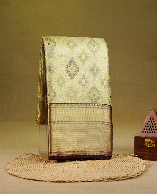 Yellowish gold colour pure tissue silk saree