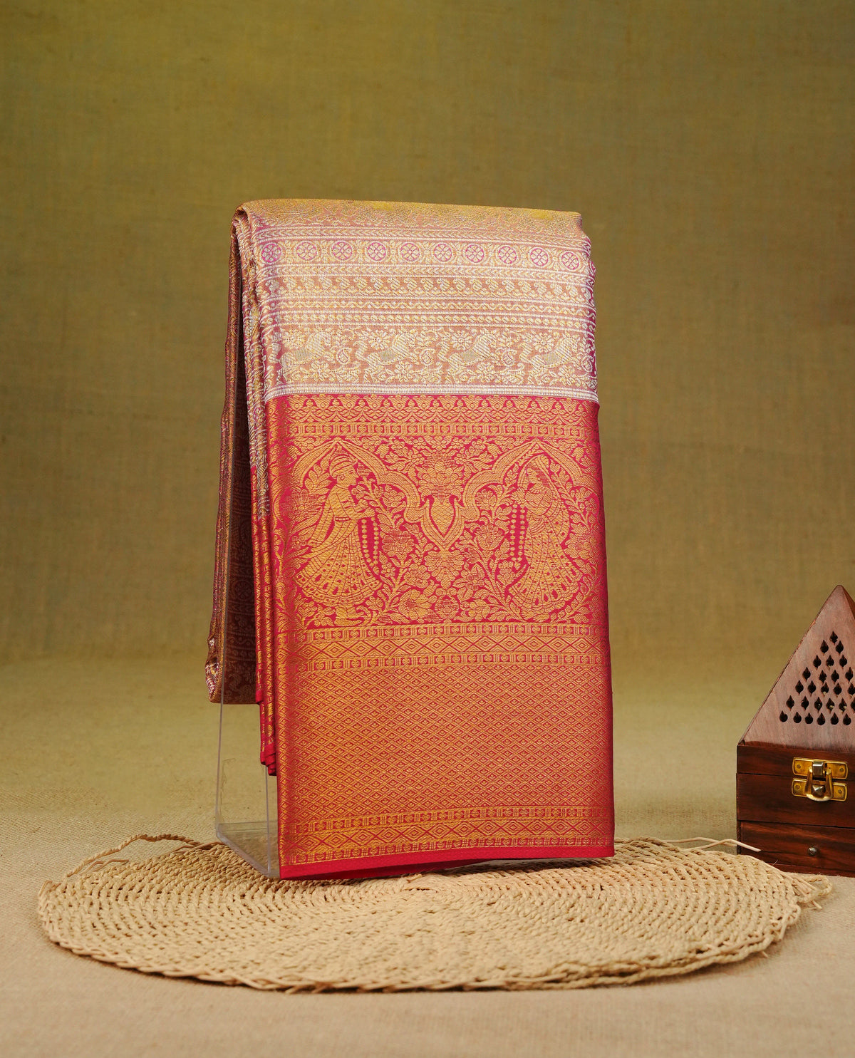 Gold & light pink double shade colour pure tissue silk saree featuring gold designed stripes on body, complemented by contrast red colour with traditional border, comes with matching blouse piece.