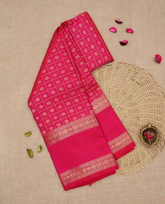 Magenta colour Traditional Kancheepuram silk saree featuring Gold zari Motifs on checks on body, complemented by self colour with traditional border, comes with matching blouse piece.